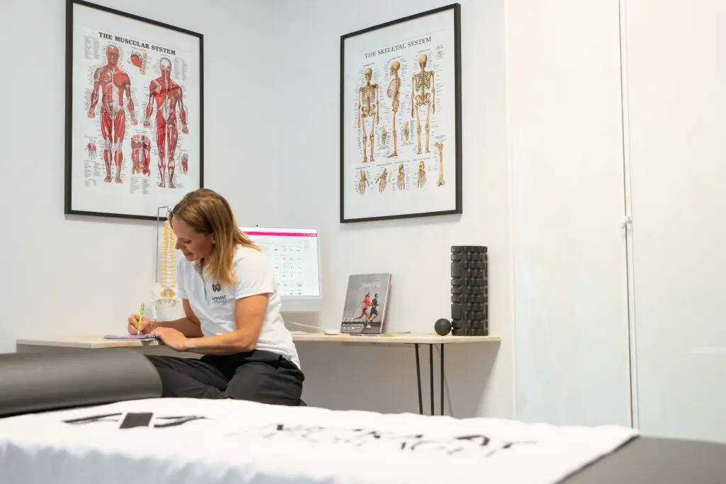 Therapist taking notes at table