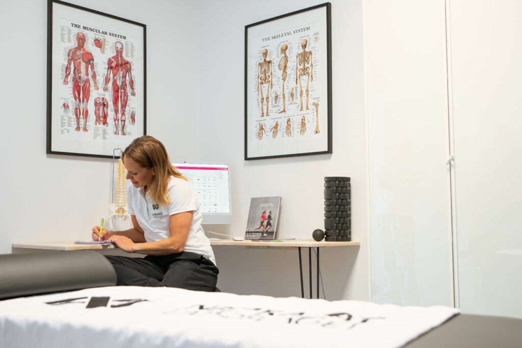 Therapist taking notes at table